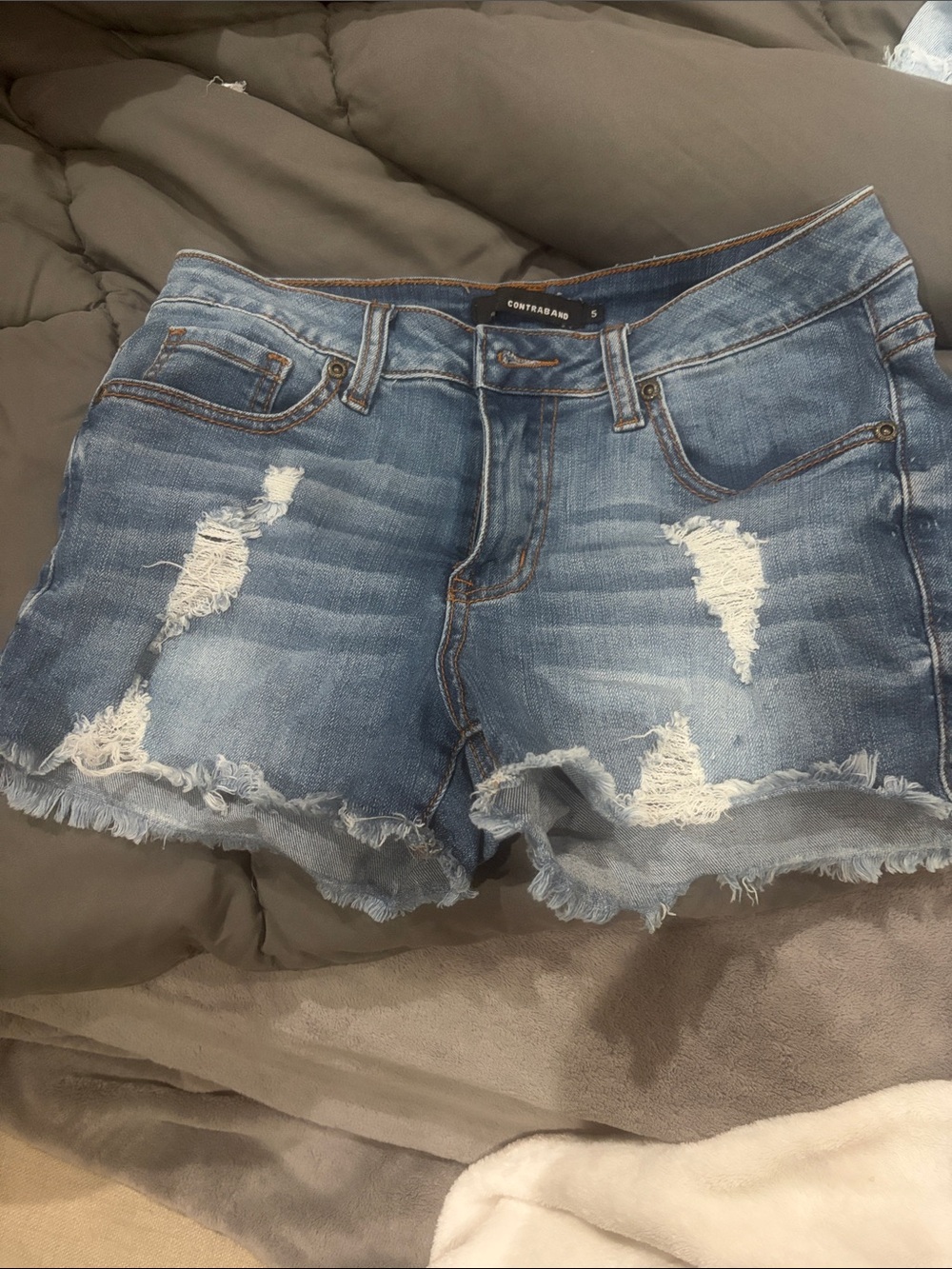 Contraband Women's Light Blue Distressed Denim Shorts